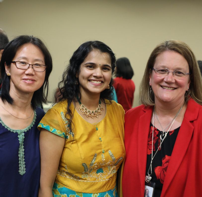 Three Bechtel team members at the B-InspirAsian Diwali Celebration.