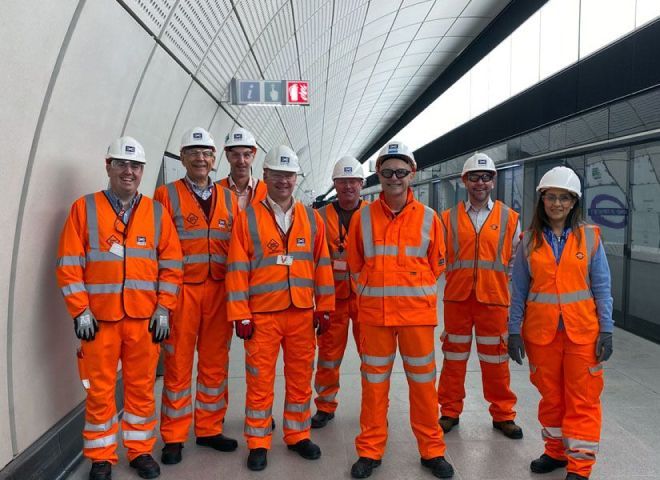 Group of Bechtel team members wearing safety gear at Elizabeth Line.