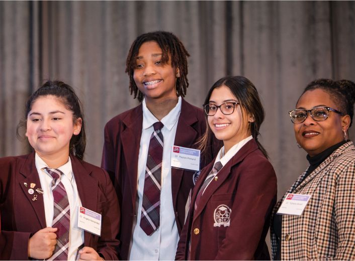 Three female students participating in SWENext.