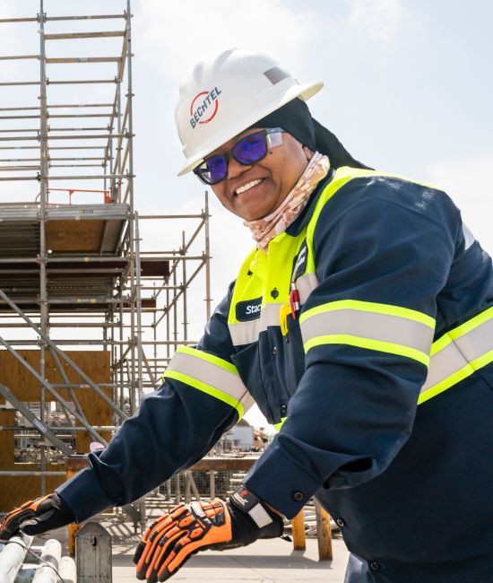 Bechtel team member wearing safety gear working on a project site.