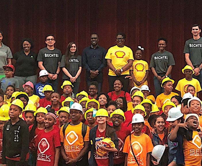 A group of children with Bechtel volunteers at the National Society of Black Engineers' Summer Engineering Experience for Kids.