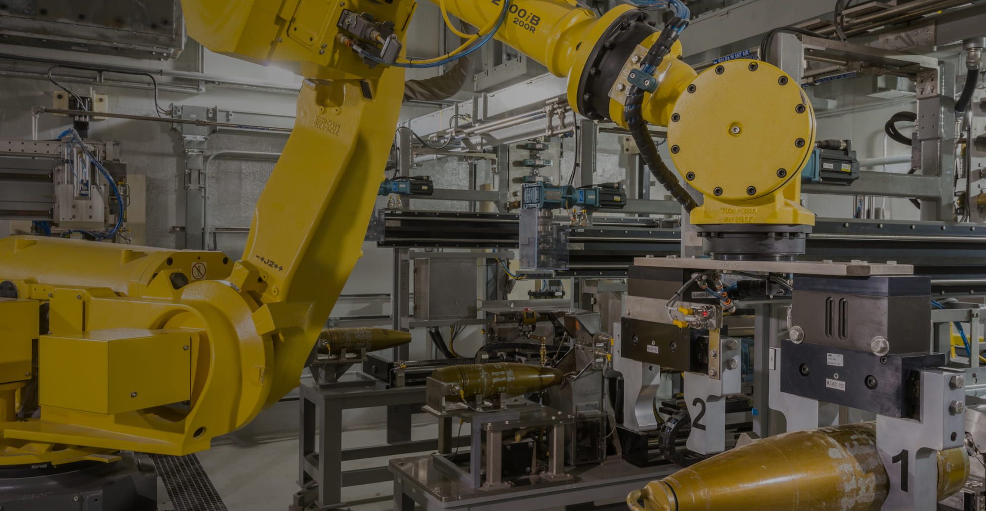 A large yellow robotic arm at Pueblo Chemical Agent-Destruction Facility.